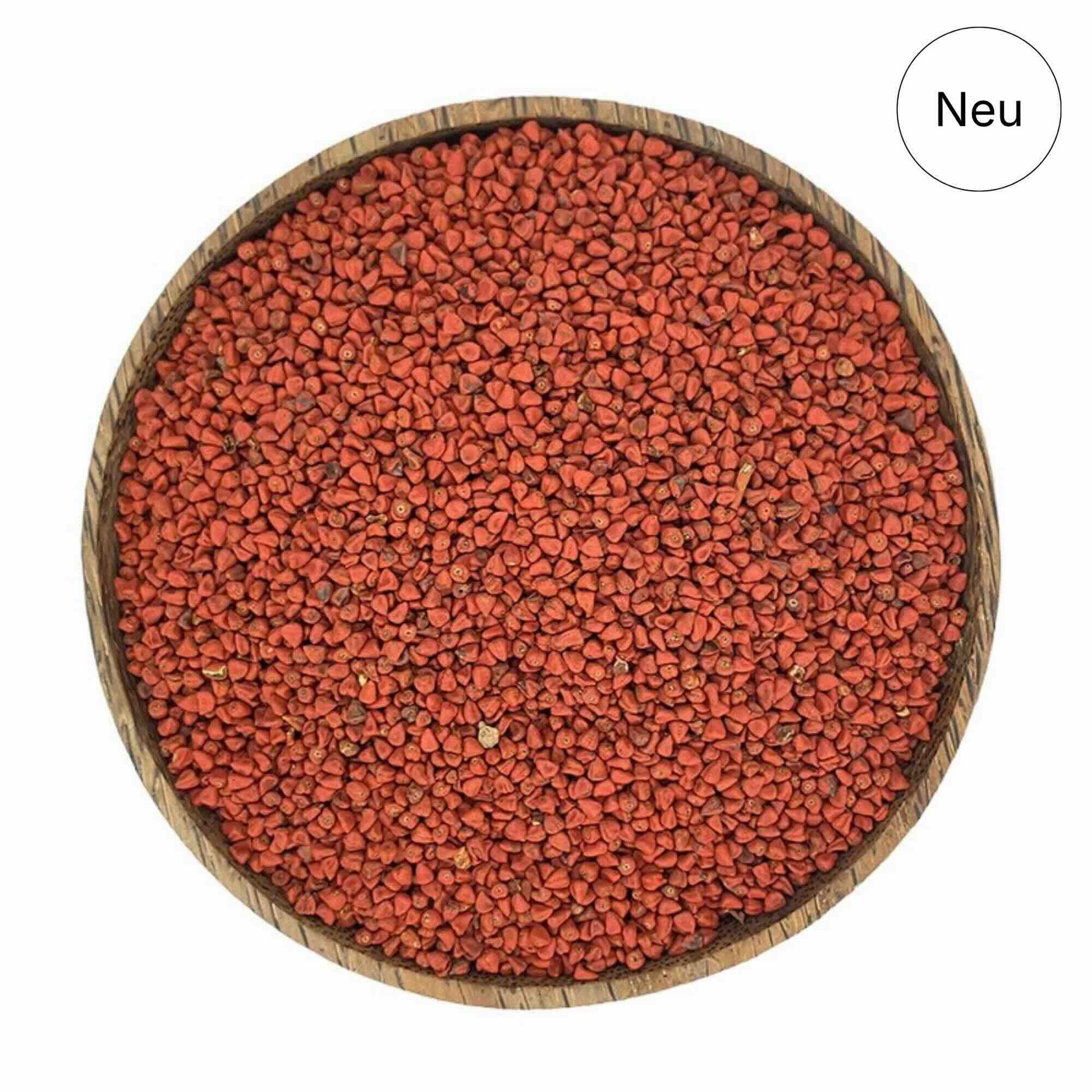 Annatto Samen in Holzschale – natürlicher Pflanzenfarbstoff aus Bixa orellana