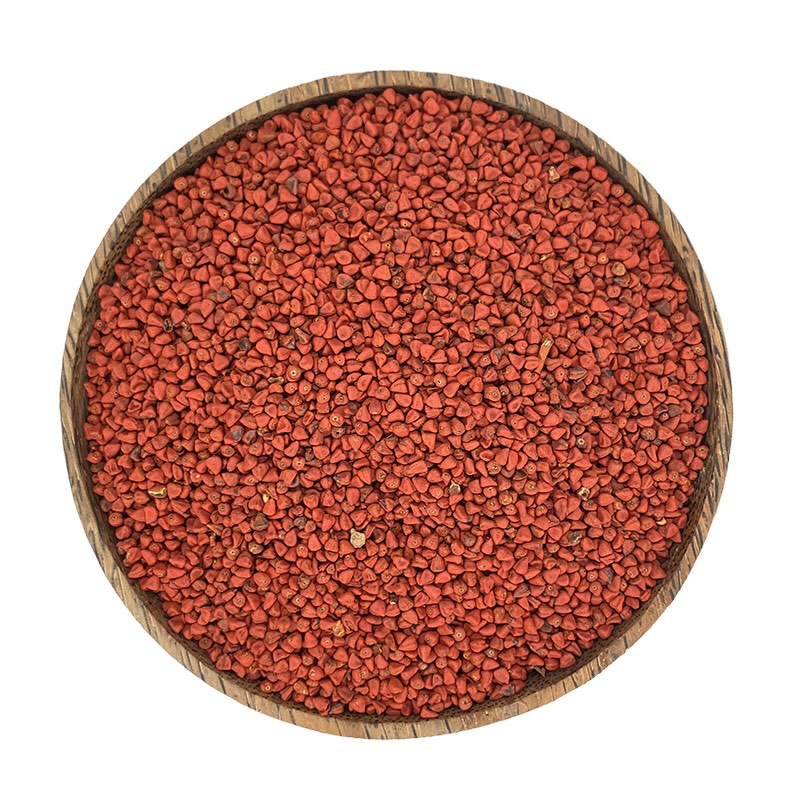 Annatto Samen in Holzschale – natürlicher Pflanzenfarbstoff aus Bixa orellana